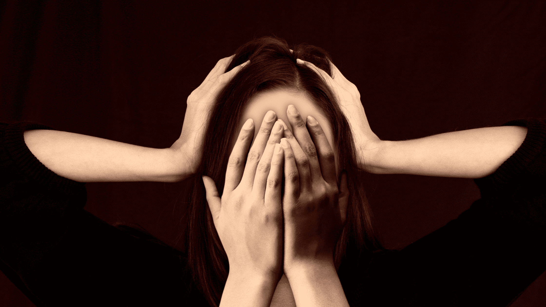 A student with eyes and ears covered dealing with test anxiety.